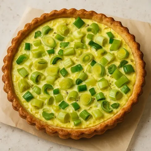 Recette experte de tarte salée aux poireaux, lardons et vin blanc